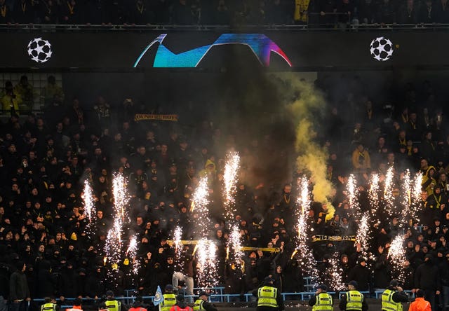 Young Boys fans in the stands set off fireworks
