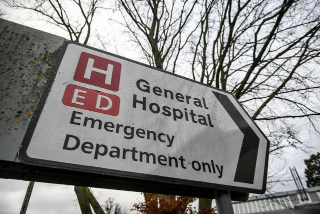 A General Hospital and Emergency Department road sign