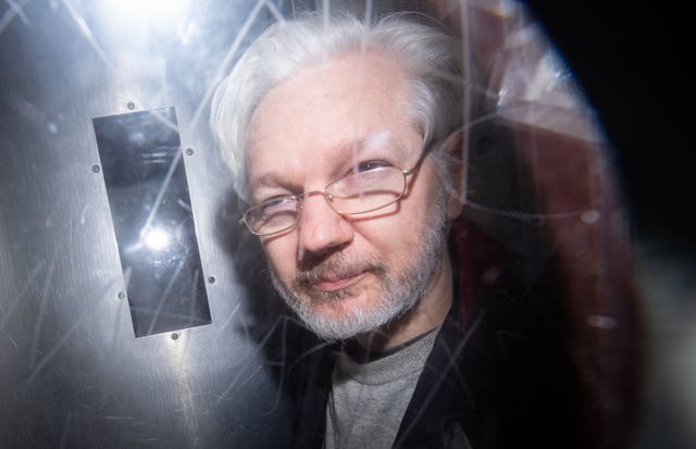 Julian Assange leaves court in January 2020