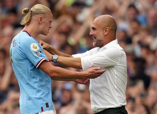 Guardiola (right) feels his medical staff have done an excellent job with Haaland