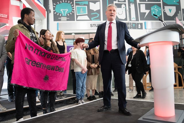 Protesters and Sir Keir Starmer