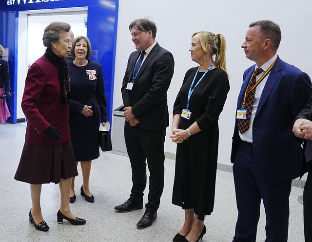 The Princess Royal meets with (left to right) Rob Forster, Deputy CEO at NHS University Hospitals of Liverpool Group, Natalie Hudson, Executive Managing Director of the Royal Liverpool Hospital, and Peter Turkington, Executive Managing Director of Aintree University Hospital, as she arrives for a visit to the Royal Liverpool University Hospital to meet and thank emergency responders following the incident 