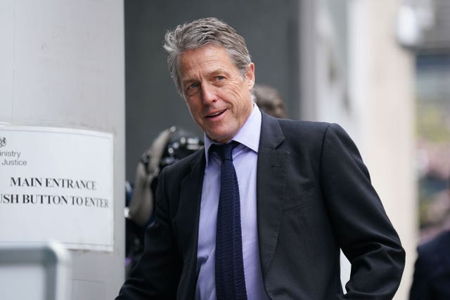 Hugh Grant arrives at the Rolls Buildings in central London 