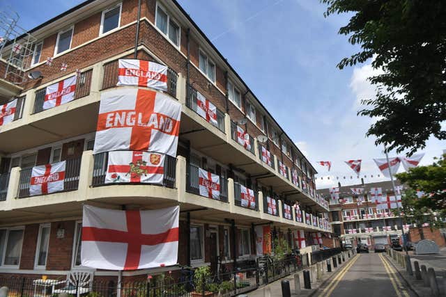 England flags fly in the Kirby Estate in Bermondsey, London