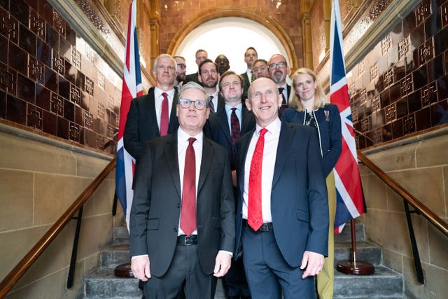 Labour Party leader Sir Keir Starmer and shadow defence secretary, John Healey with some of the 14 former military parliamentary candidates Labour has selected to fight the General Election, during a visit to the Fusilier Museum in Bury in Greater Manchester