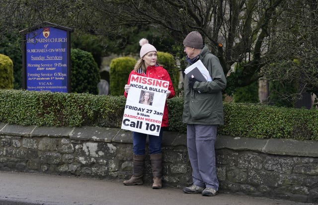 People with signs