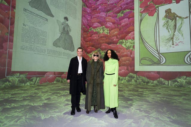 Anna Wintour (centre) with Mark Guiducci and Chioma Nandi views the immersive exhibition