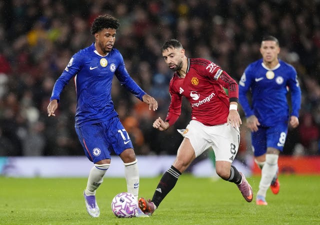 Chelsea’s Andrey Santos, left, and Manchester United’s Bruno Fernandes battle for the ball