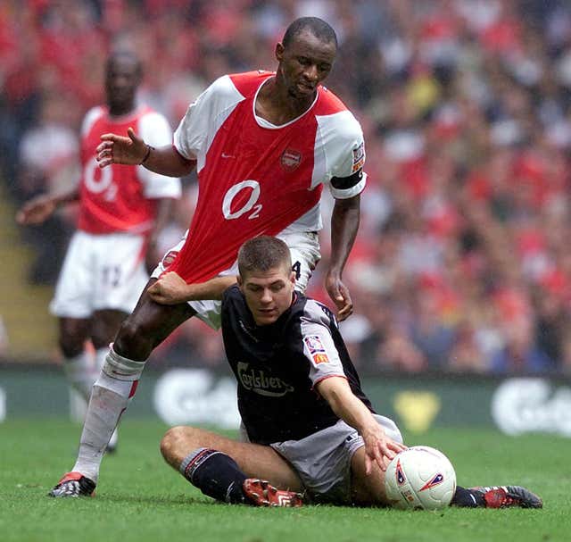 Arsenal’s Patrick Vieira tussles with Liverpool’s Steven Gerrard
