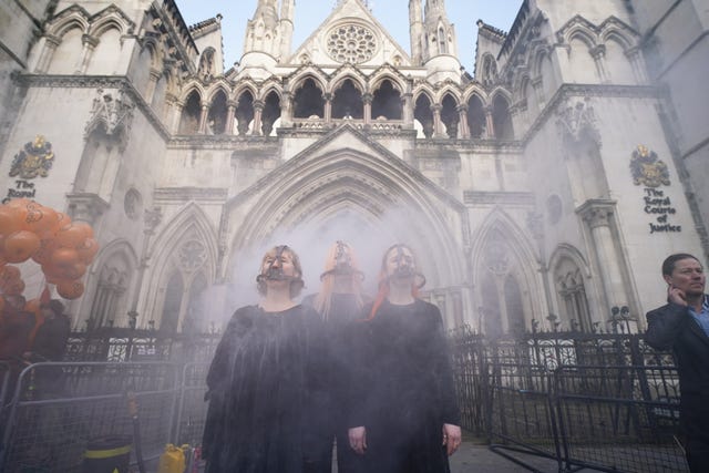 Several campaigners protested outside the court building on the first day of the appeal hearing (Jordan Pettitt/PA)