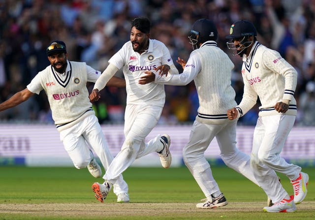 Mohammed Siraj, centre left, and India celebrate victory at Lord's