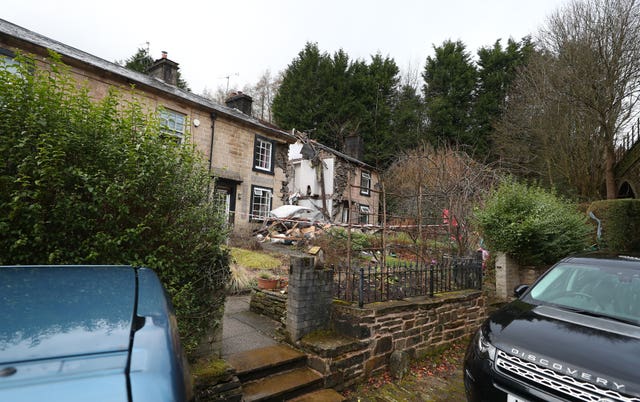 The scene in Ramsbottom, Bury, Greater Manchester, where the body of a woman has been found after a house collapsed on Wednesday evening 