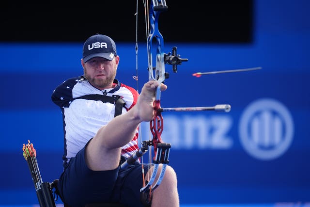 Matt Stutzman competing in the para archery, firing the bow with his teeth and foot