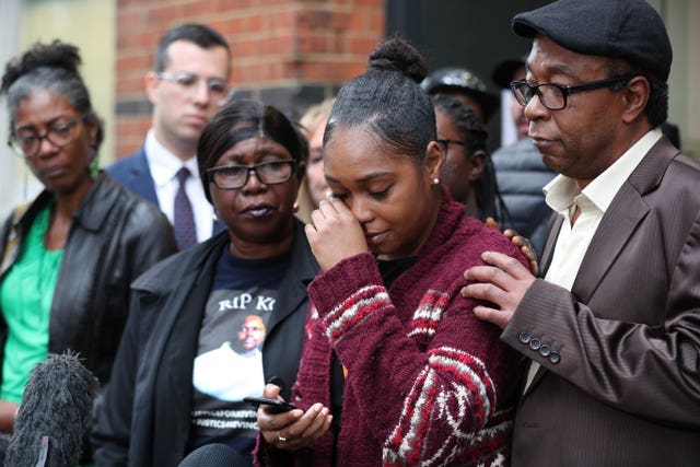 Wendy Clarke (second left) and Tellecia Strachen (second right) speaking to reporters outside a coroner's court