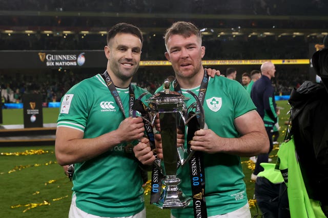 Peter O'Mahony, right, and Conor Murray celebrate success in the 2024 Guinness Six Nations