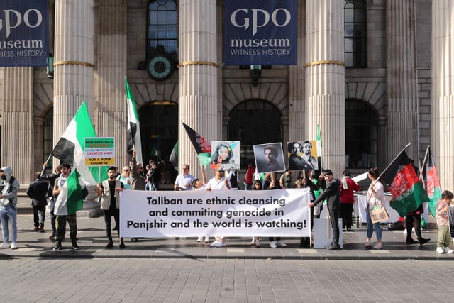 People attend a protest against Taliban persecution of women (Niall Carson/PA)