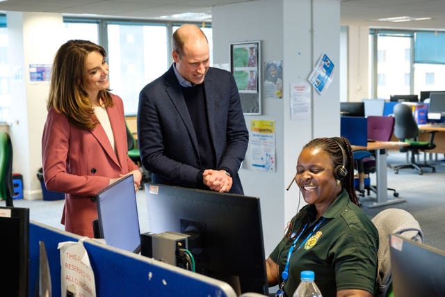 The Duke and Duchess of Cambridge talking to staff during a visit to the London Ambulance Service 111 control room in Croydon. Kensington Palace