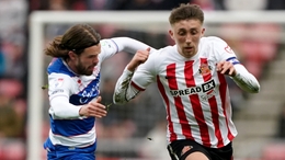 Sunderland’s Dan Neil battles for the ball against QPR’s Lucas Andersen (Owen Humphreys/PA)