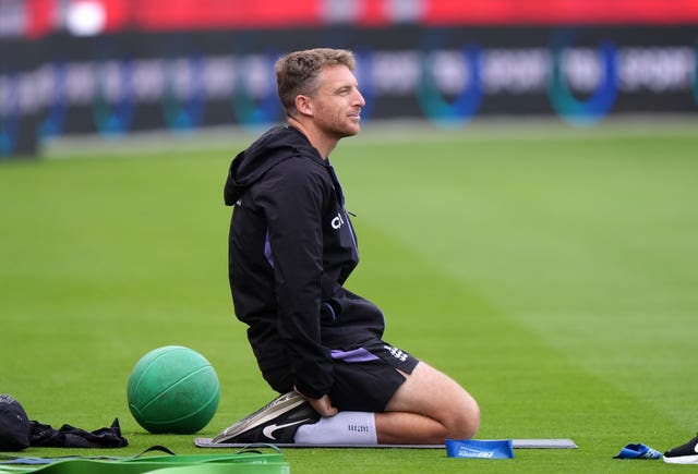 Jos Buttler drops his to knees at an England training session.