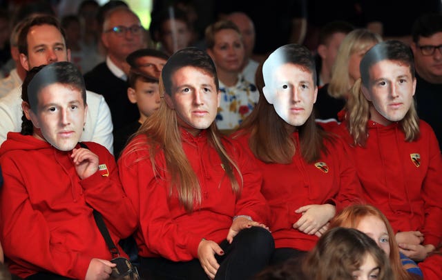 England fans sport Tom Curry face masks at Crewe and Nantwich RFC