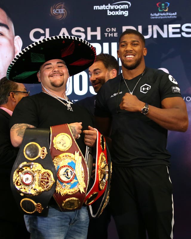 Andy Ruiz Jr shows off the belts he won from Anthony Joshua