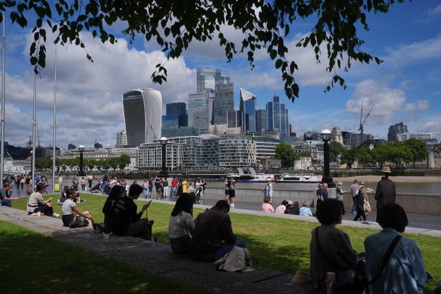People sitting in Potters Fields Park, central London