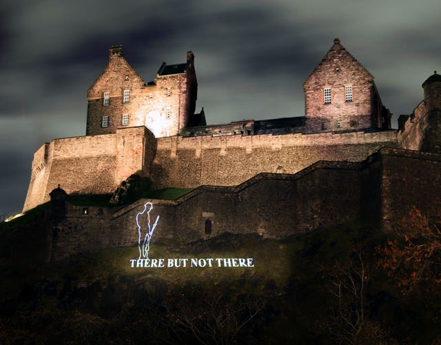 A First World War Tommy projected on to Edinburgh Castle 