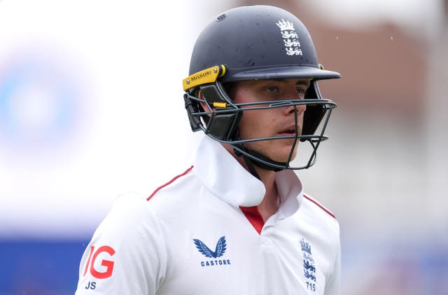 Jamie Smith leaves the field after being dismissed