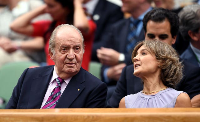 Juan Carlos I of Spain, left