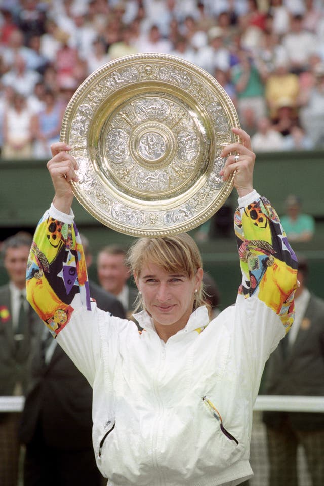 Steffi Graf celebrates with the Wimbledon trophy in 1993