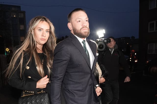 Mixed martial arts fighter Conor McGregor and partner Dee Devlin arrive back at the High Court in Dublin