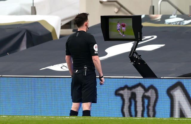 Referee Chris Kavanagh consulted the pitchside monitor before ruling out Edinson Cavani's opener