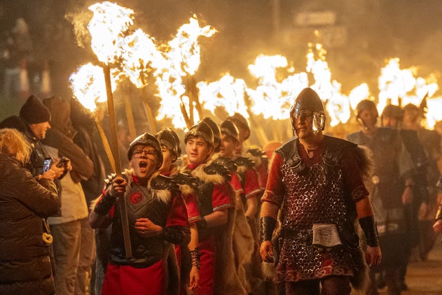 Youngsters take part in the in the Junior Up Helly Aa torchlight procession