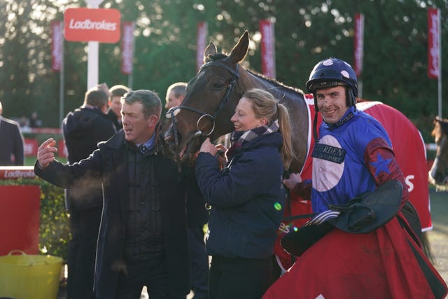 Jockey Aidan Coleman (right) in the parade ring after winning the Long Walk Hurdle on Paisley Park at Kempton on Boxing Day