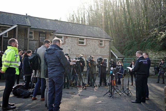 Police speaking to the media