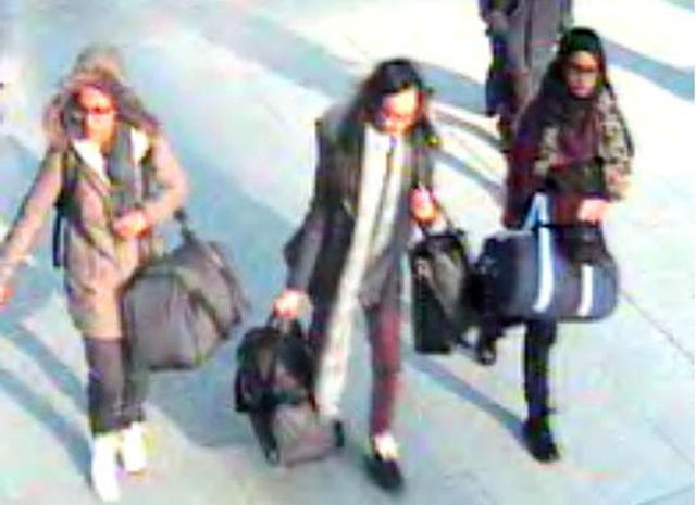 Shamima Begum, right, leaving the UK with Amira Abase and Kadiza Sultana