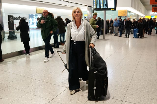 Presenter Jane Moore arrives at Heathrow airport