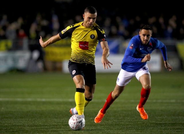 Harrogate's Jack Muldoon in FA Cup first round action against Portsmouth last year 