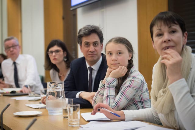 Environment Secretary Michael Gove (left), former Labour leader Ed Miliband (centre), Green Party leader Caroline Lucas (right), and Swedish climate activist Greta Thunberg (2nd right)