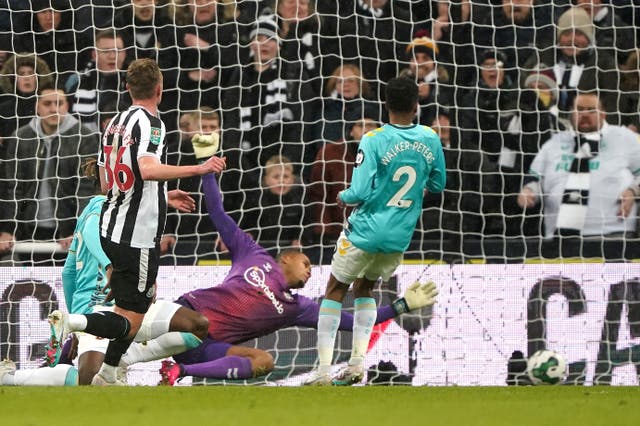 Sean Longstaff, left, scores Newcastle’s second goal