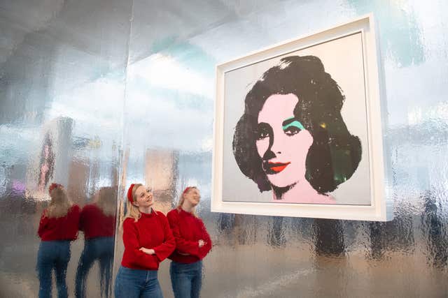 A gallery assistant views Silver Liz, 1963 (Dominic Lipinski/PA)