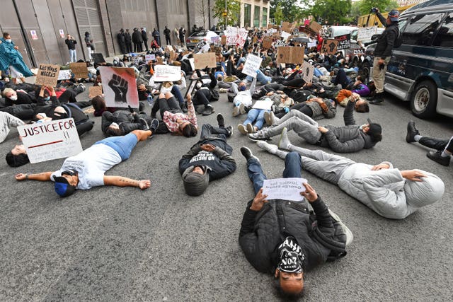 People take part in the protest rally at the US Embassy (Stefan Rousseau/PA Wire)