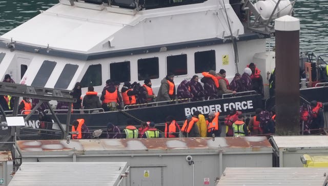 Some of the people being brought to port in Dover on Boxing Day