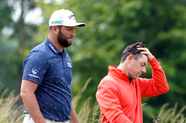 Jon Rahm and Rory McIlroy file photo