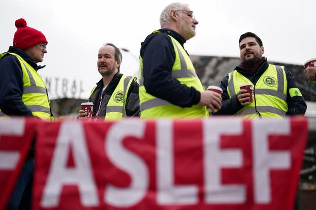 Members of the Aslef union picket at New Street station in Birmingham