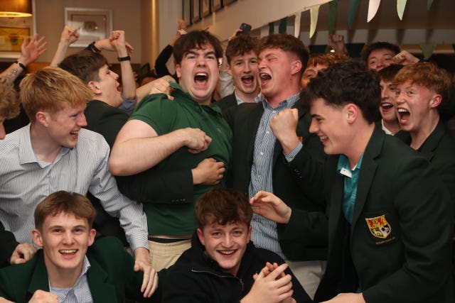 Holywood Golf Club members watch the final day of the US Masters 2026