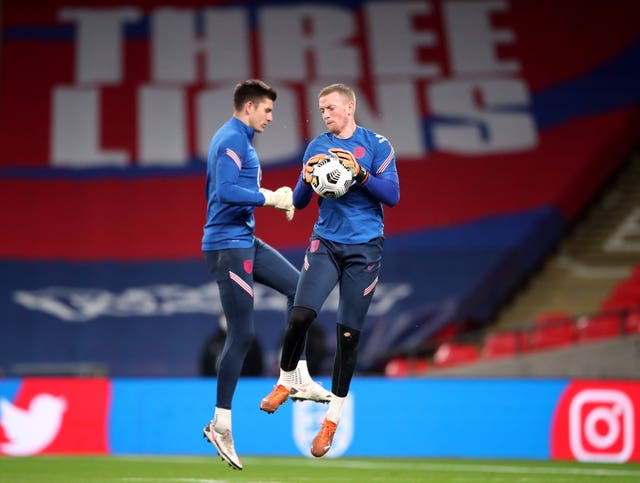 Nick Pope, left, is behind Jordan Pickford, right, in England's pecking order (Nick Potts/PA)