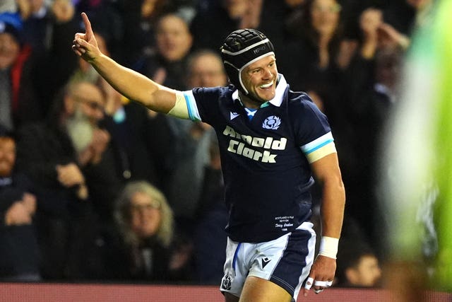 Darcy Graham celebrates after scoring against Fiji