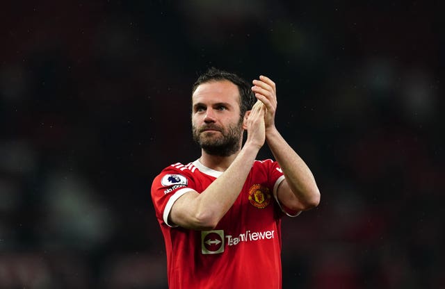 Juan Mata applauds the fans