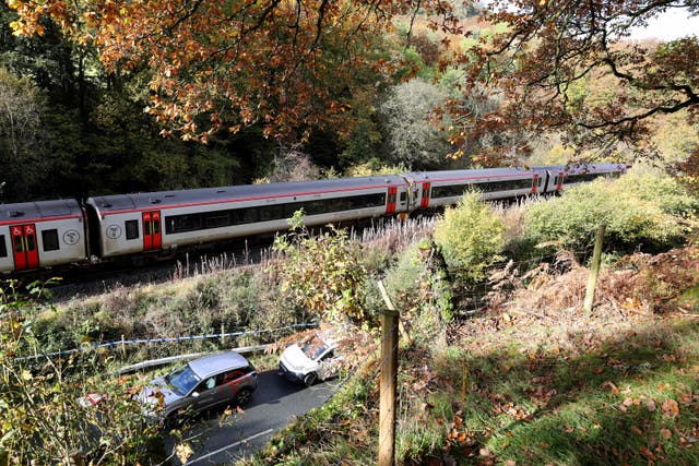 Emergency workers at the scene of the Llanbrynmair train crash